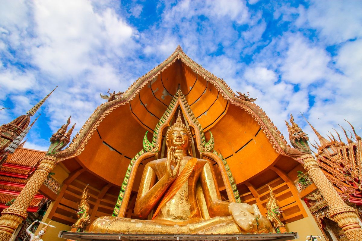 Tiger cave temple(Wat thum sueal) is a buddhist temble of kanjanabury ,thailand with Big Buddha statue and blue sky at thailand