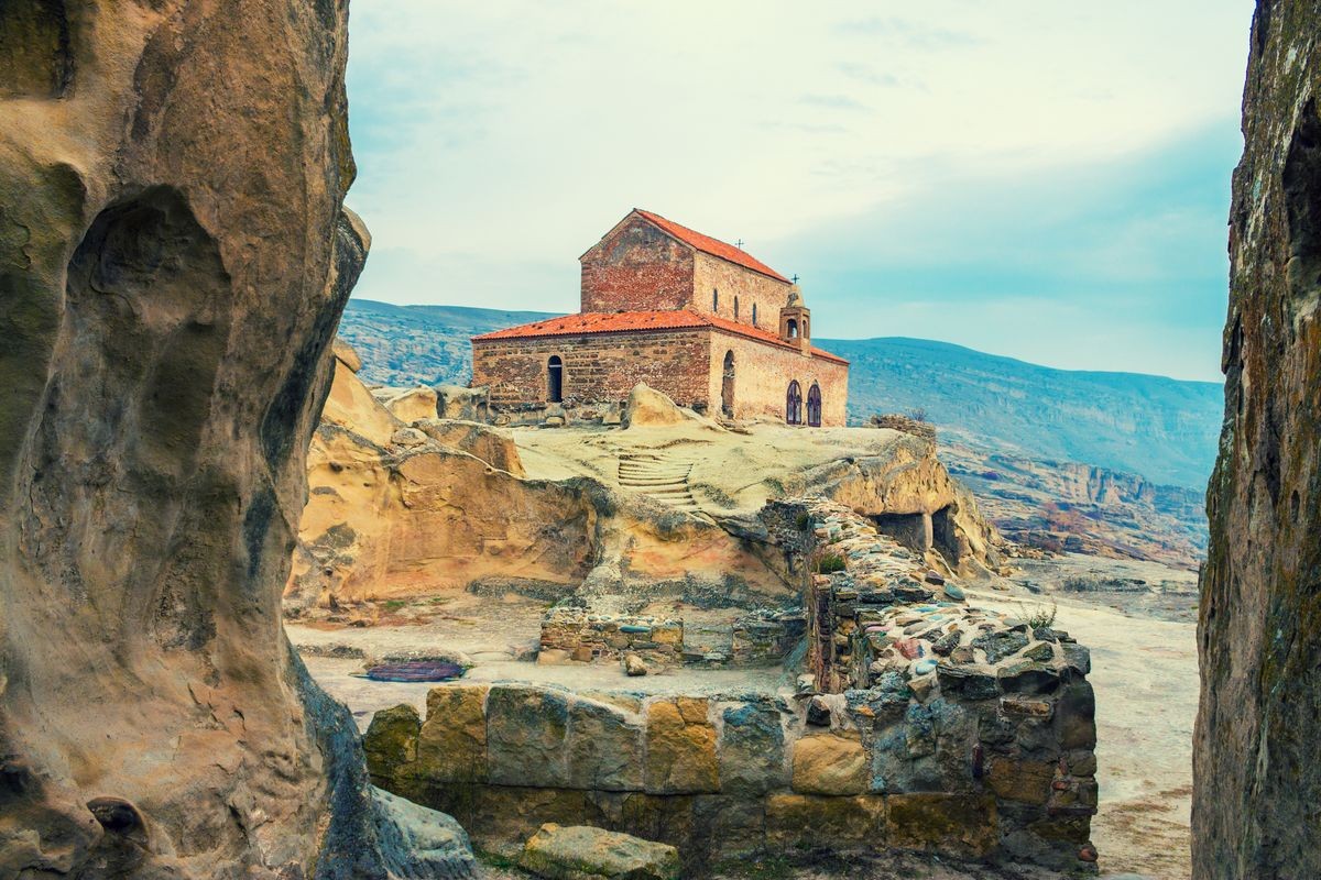 Ancient Orthodox Church in antique cave city Uplistsikhe, Georgia, Europe. 