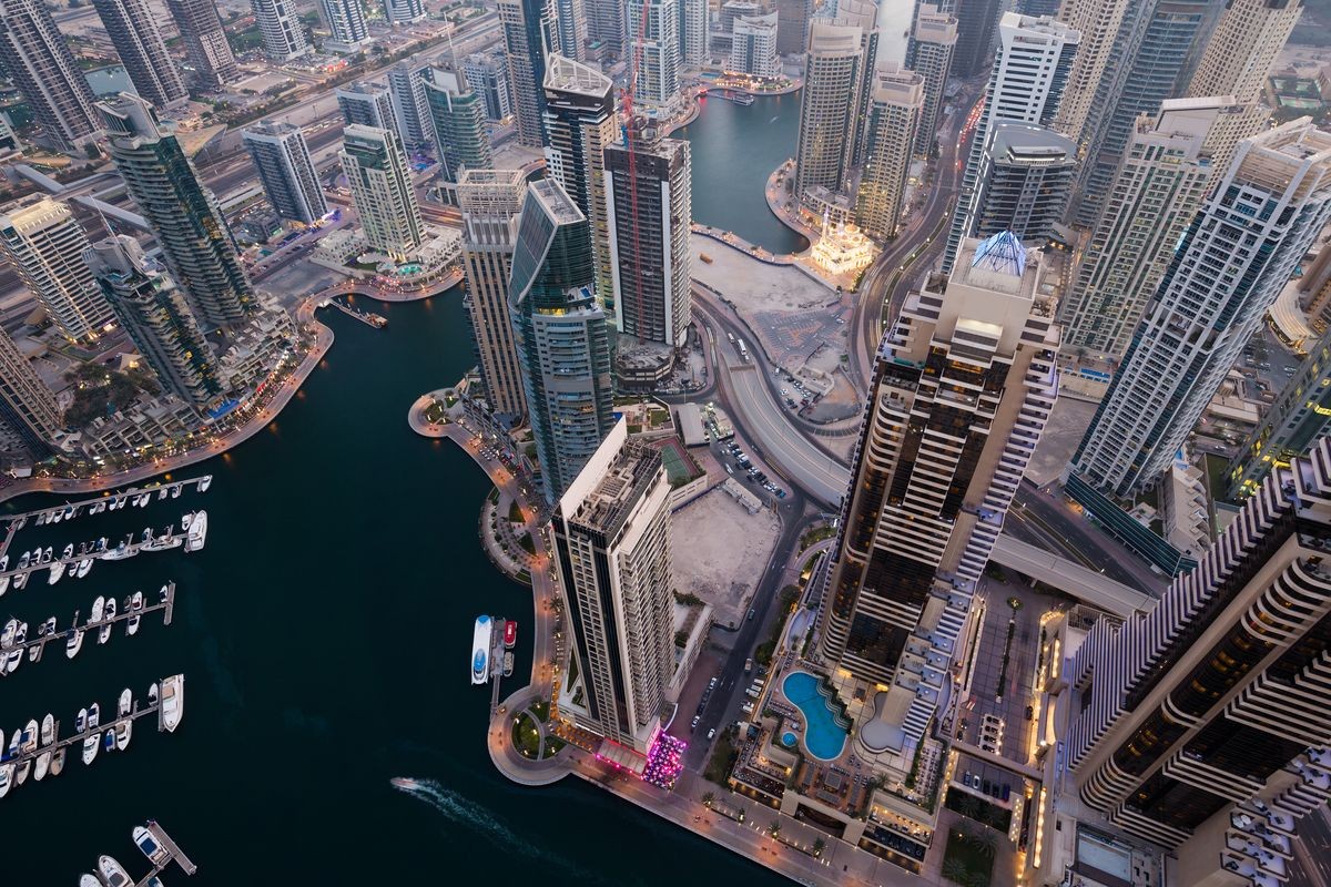 Dubai skyline, skyscrapers. Dubai Marina from above. Morning light. Dubai citylights. Luxury homes, private property. Cayan tower view.